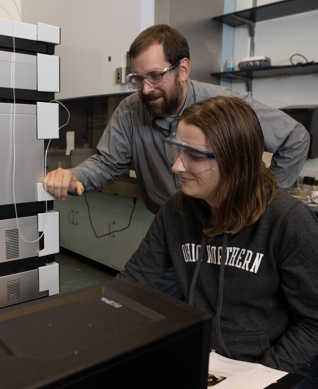 Christopher Spiese associate professor of chemistry works with chemistry students at Ohio Northern University.