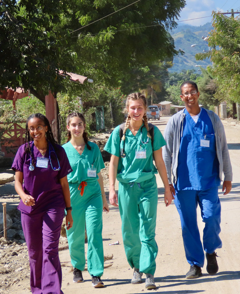 public health students walking down the street in the Dominican. 