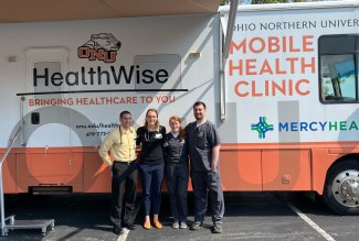 Studen and staff workers at ONU HealthWise Mobile Health Clinic.