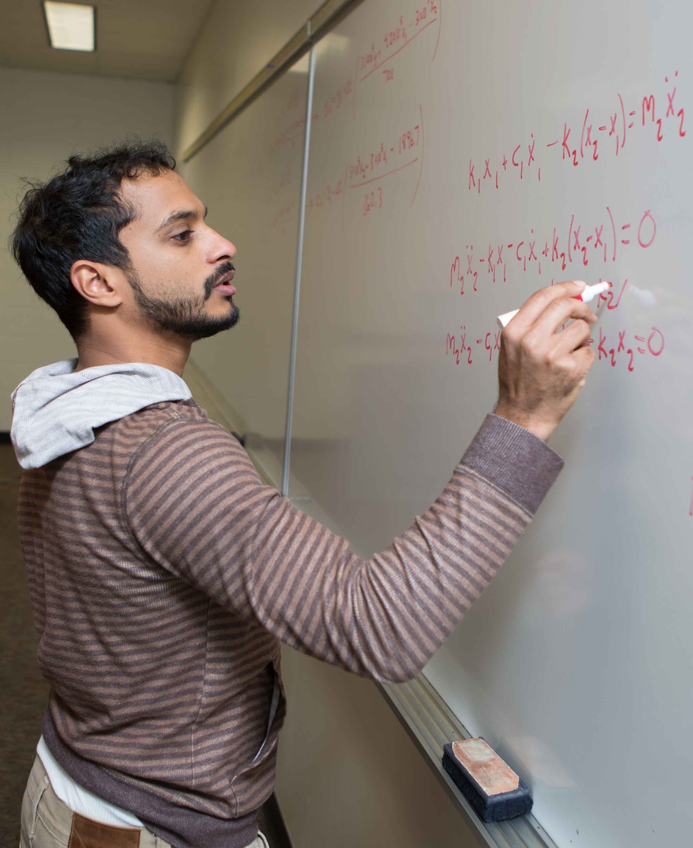 Mathematics student in class