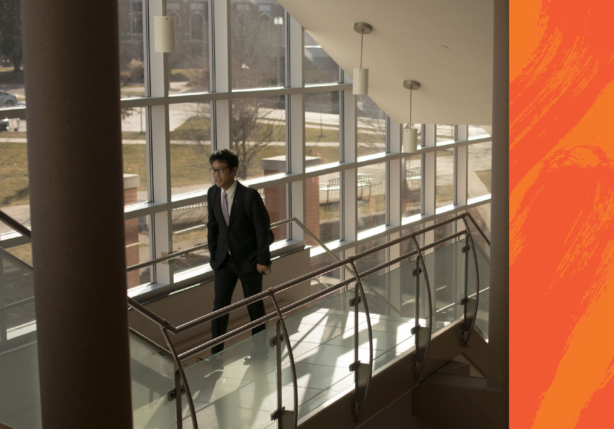 Student walking up stairs