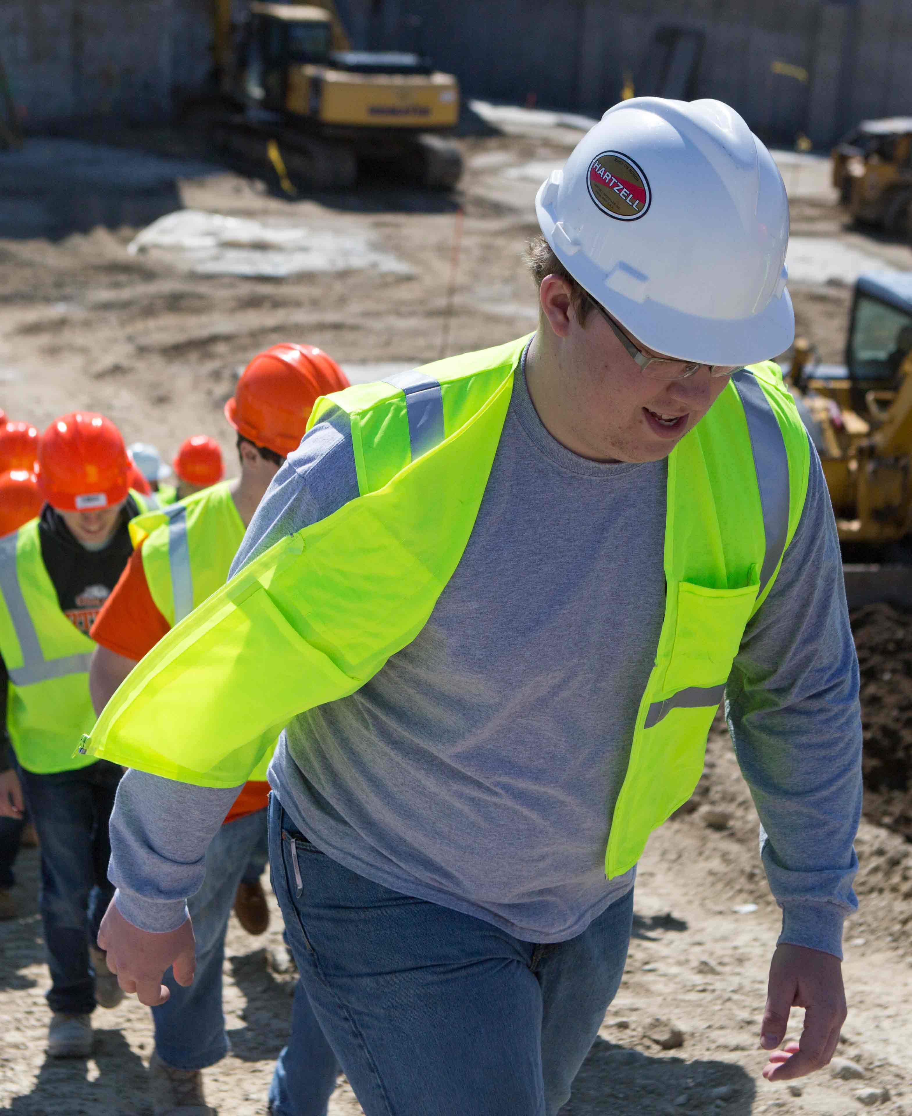 Construction management students touring a work site