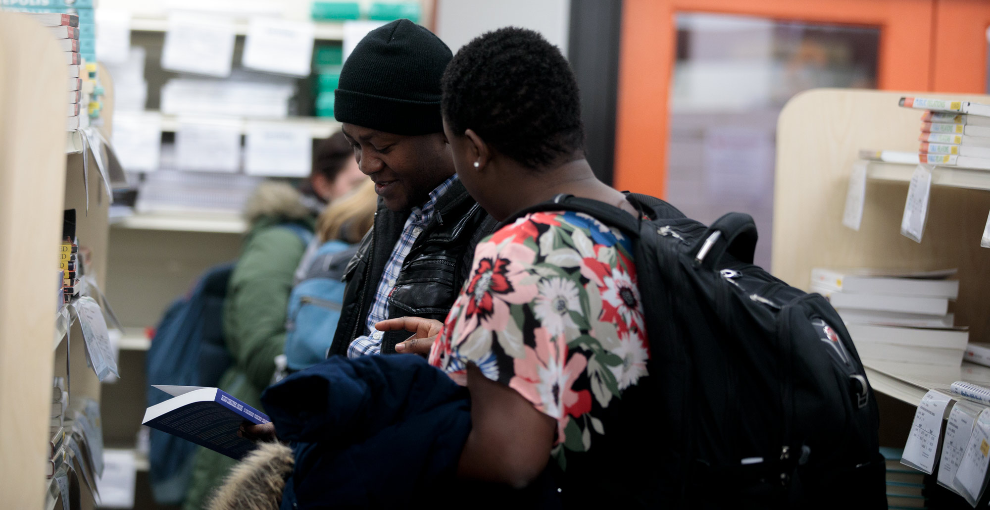 Third-year pharmacy students Thomas Besavi Morkla and Charity Onyekelu browse the shelves of the Ohio Northern University Bookstore in McIntosh Center.