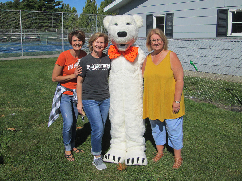 Staff members with ONU mascot Klondike