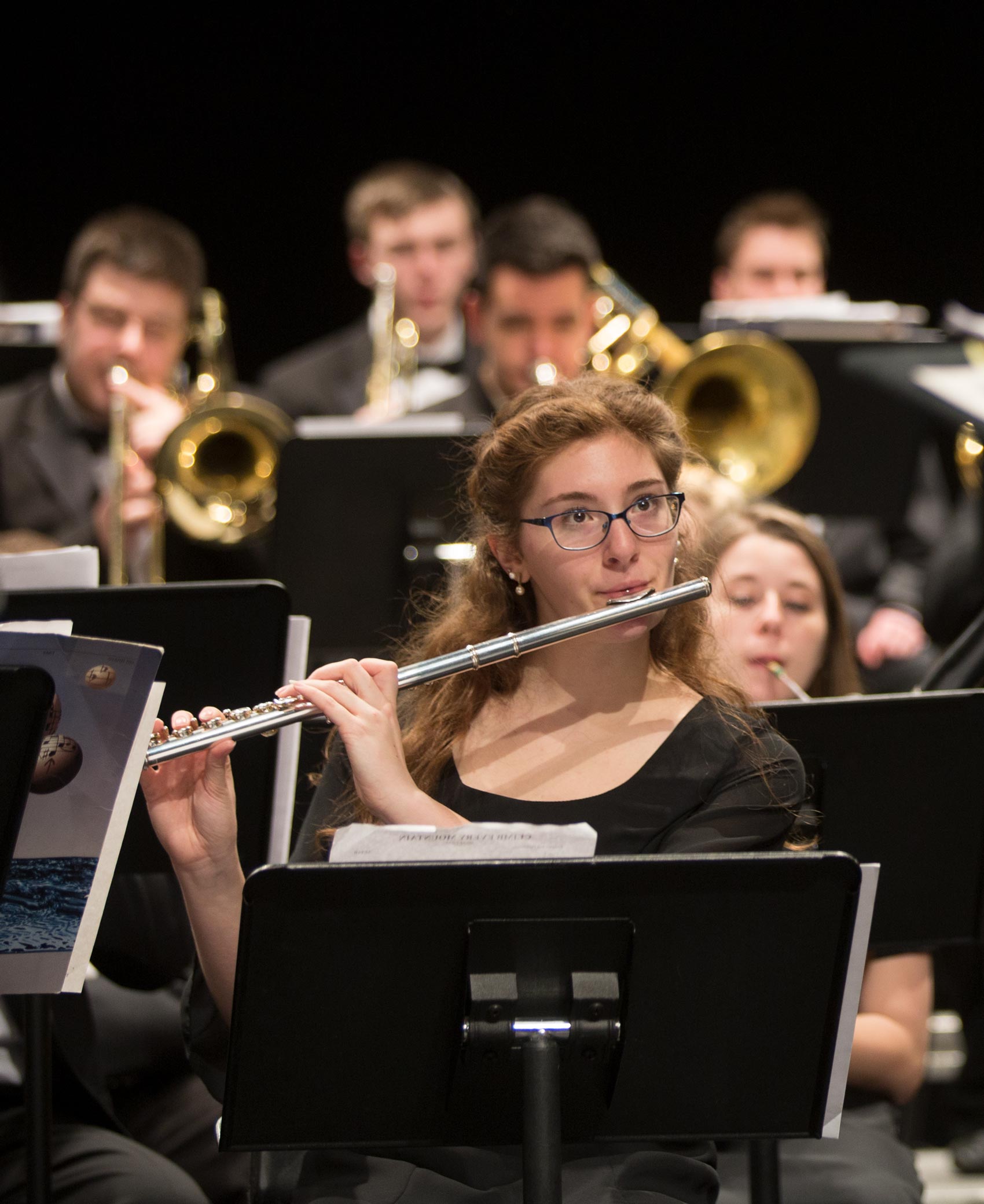 Members of the Ohio Northern University symphonic band practice before a performance.