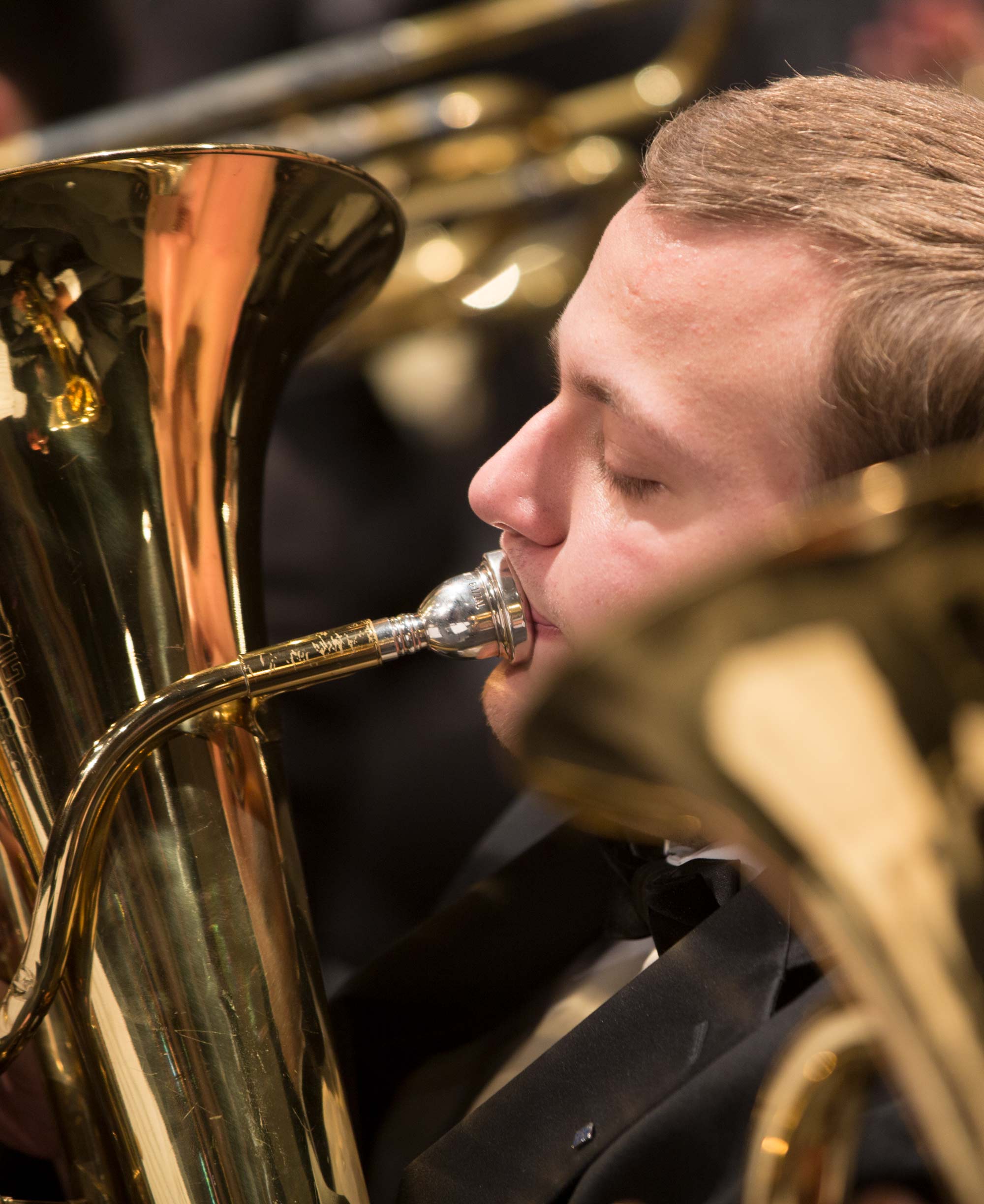 Members of the Ohio Northern University symphonic band practice before a performance.