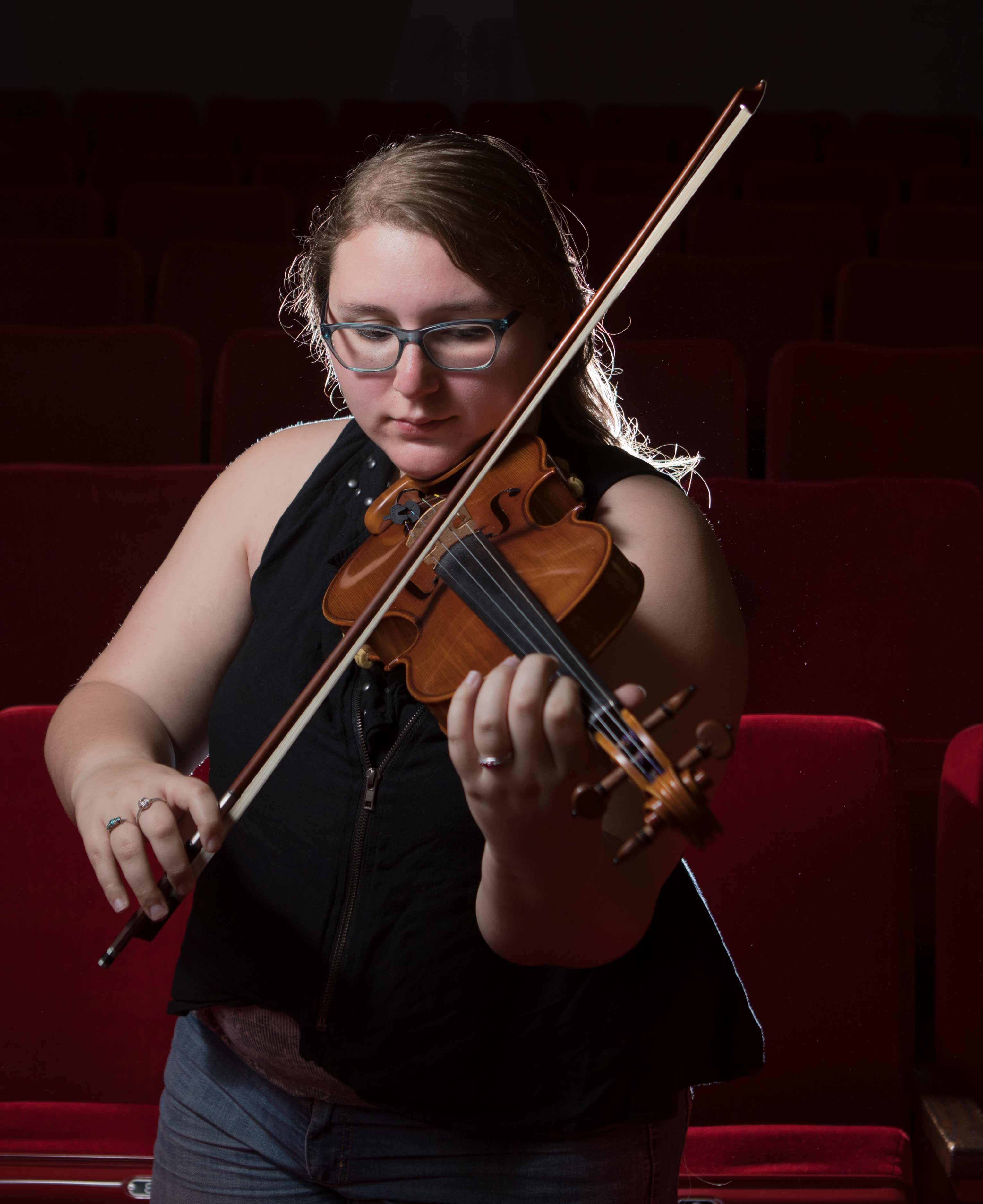 Music student performs at their senior recital 