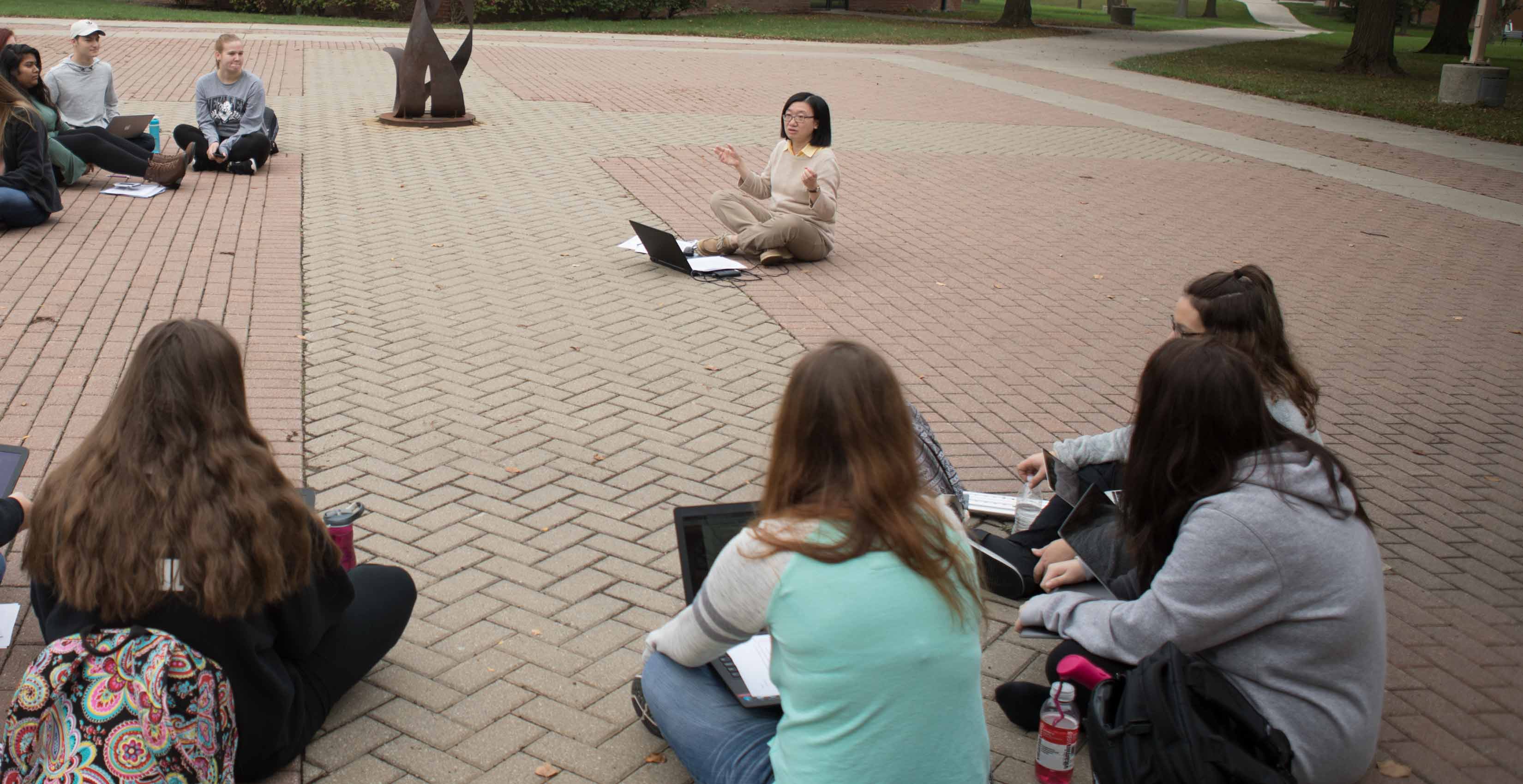 Humanities class outside of heterick memorial library