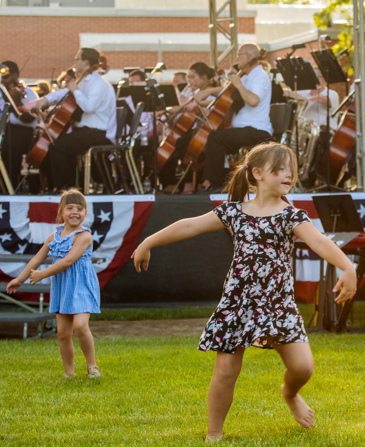 patriotic pops fans dance to the music. 