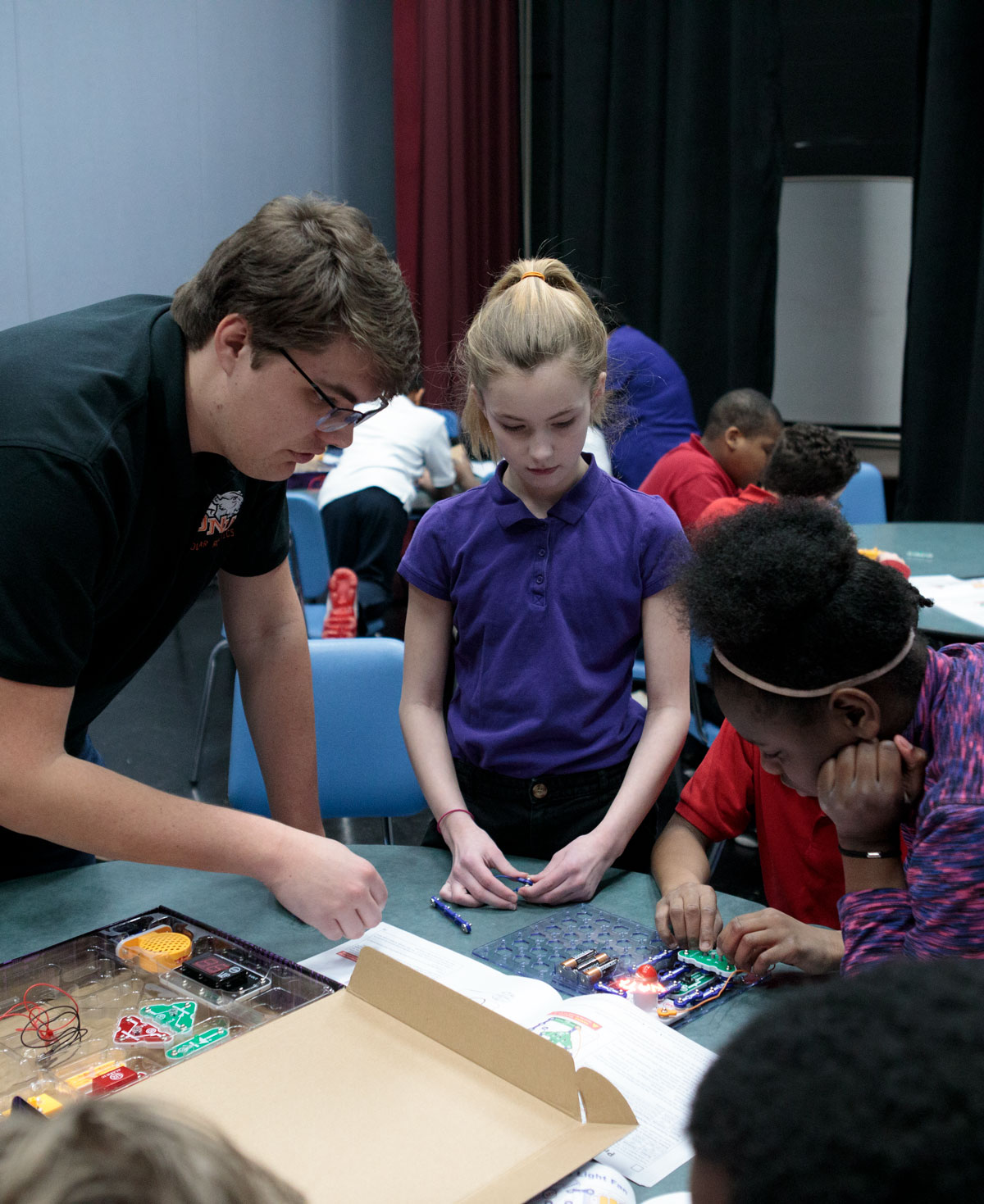 Ohio Northern University student mentors younger students. 