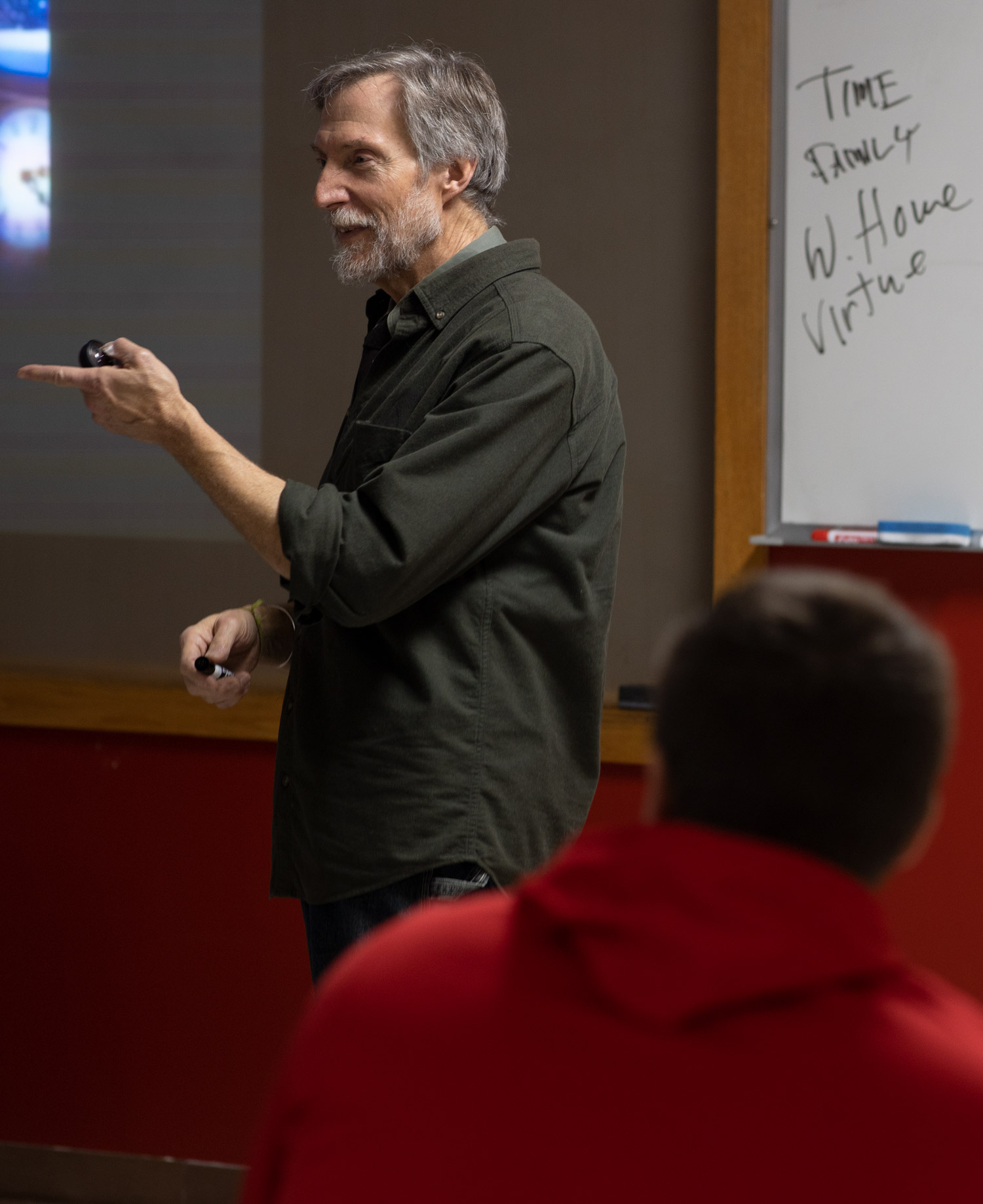 Professor of Art and Design teaches a lecture in the Wilson Art Building.