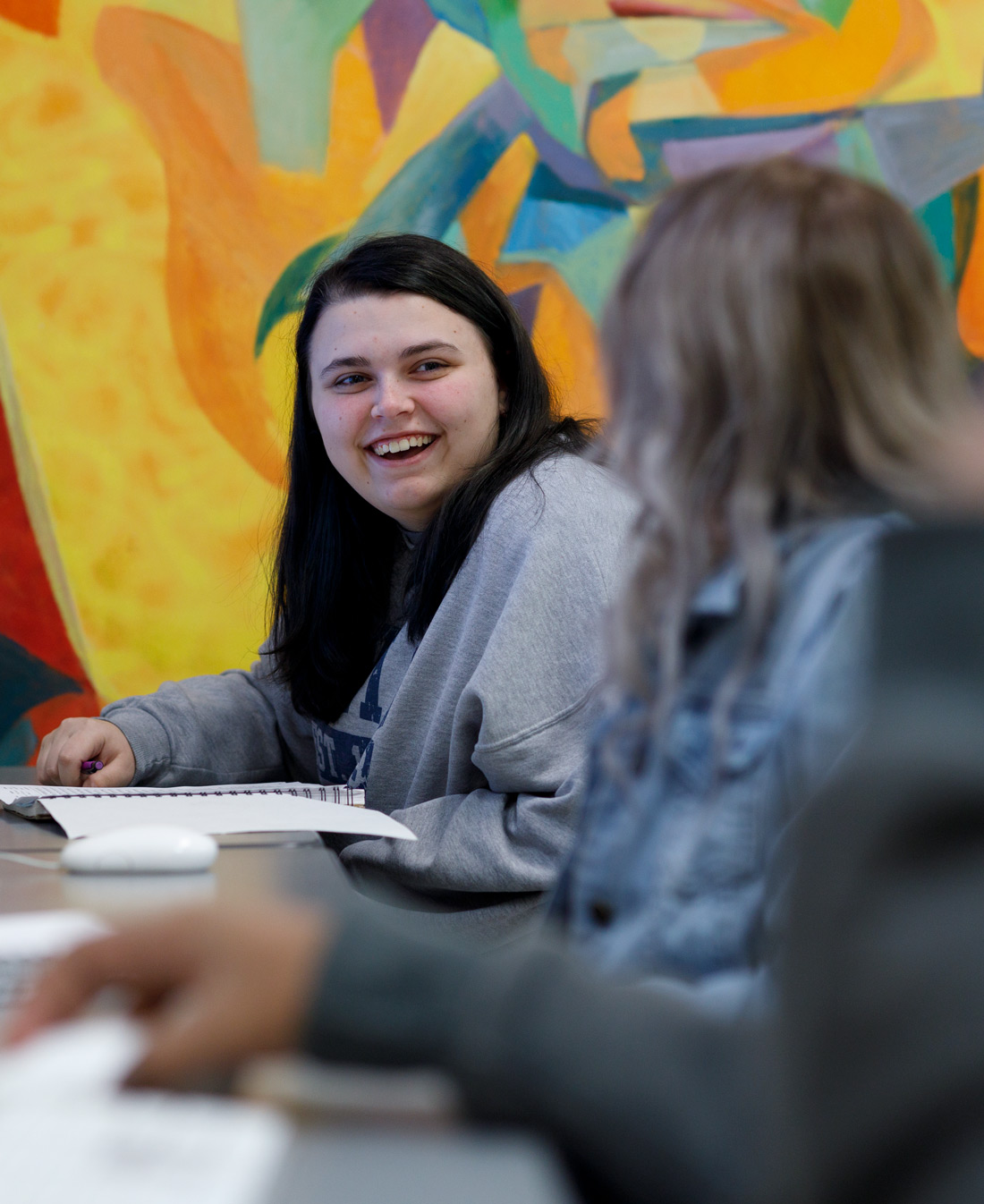 Graphic design students working on sketches in the Wilson Art Building.