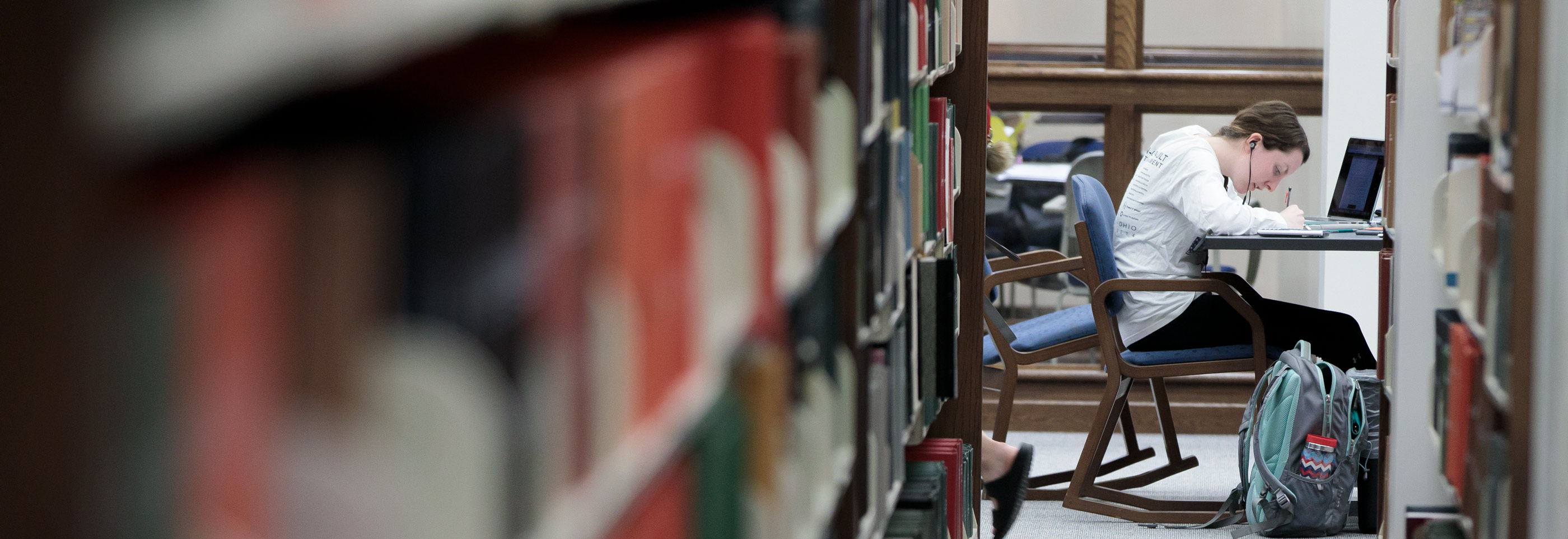 student studying in the library.