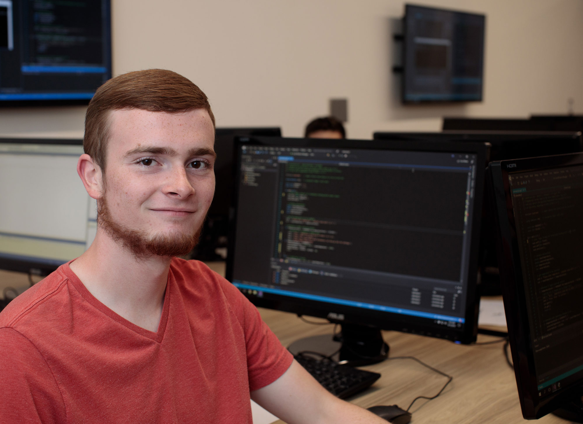 Freshman Logan Reichling is photographed in the classroom of John Estell, professor of computer engineering and computer science, in the James Lehr Kennedy Engineering Building on the campus of Ohio Northern University.