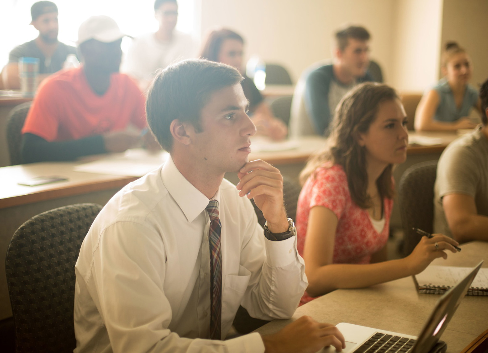 Student listens to a lecture.