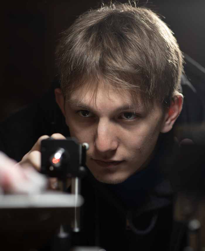 physics student working in a lab.