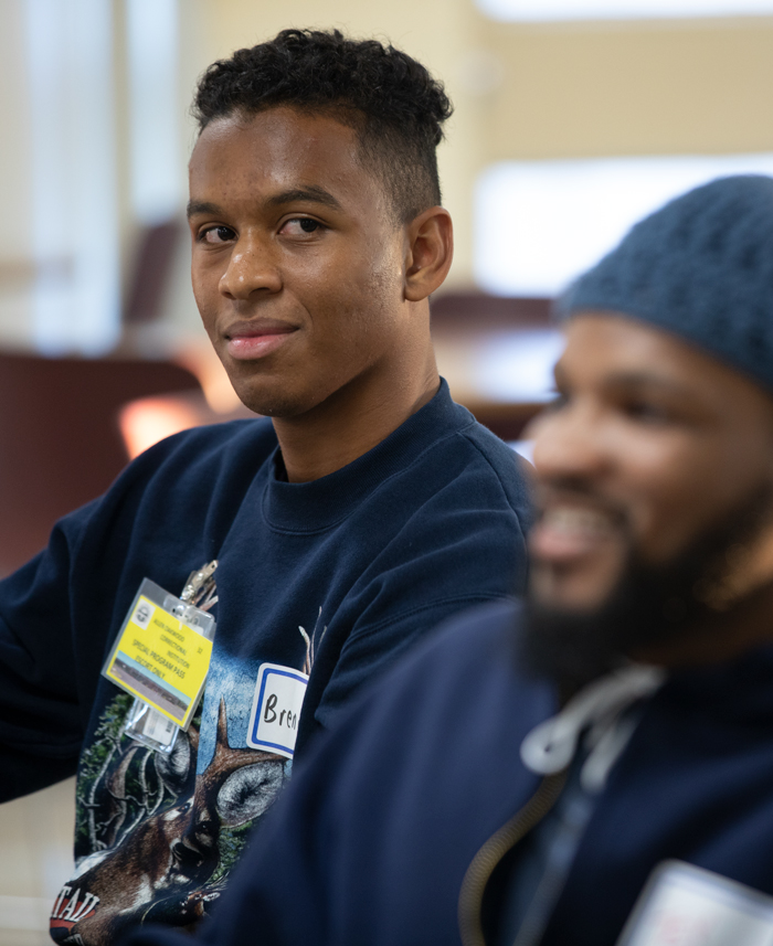 student listens to an inmate during the Inside-Out Prison Exchange Program