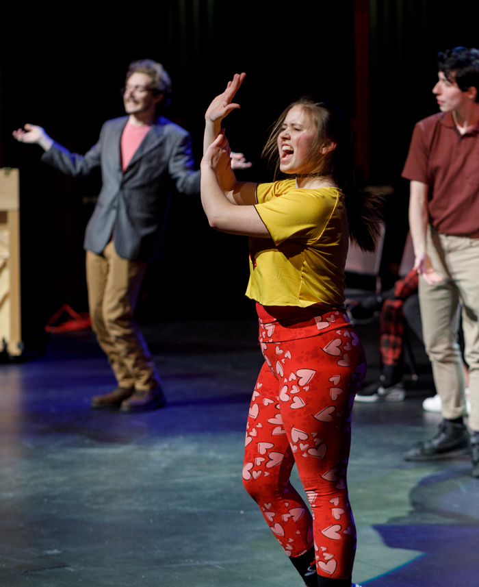 Theatre student practicing at rehearsal. 