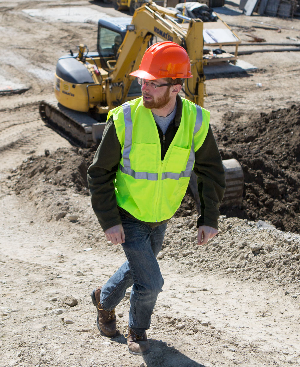 students tour a construction site.