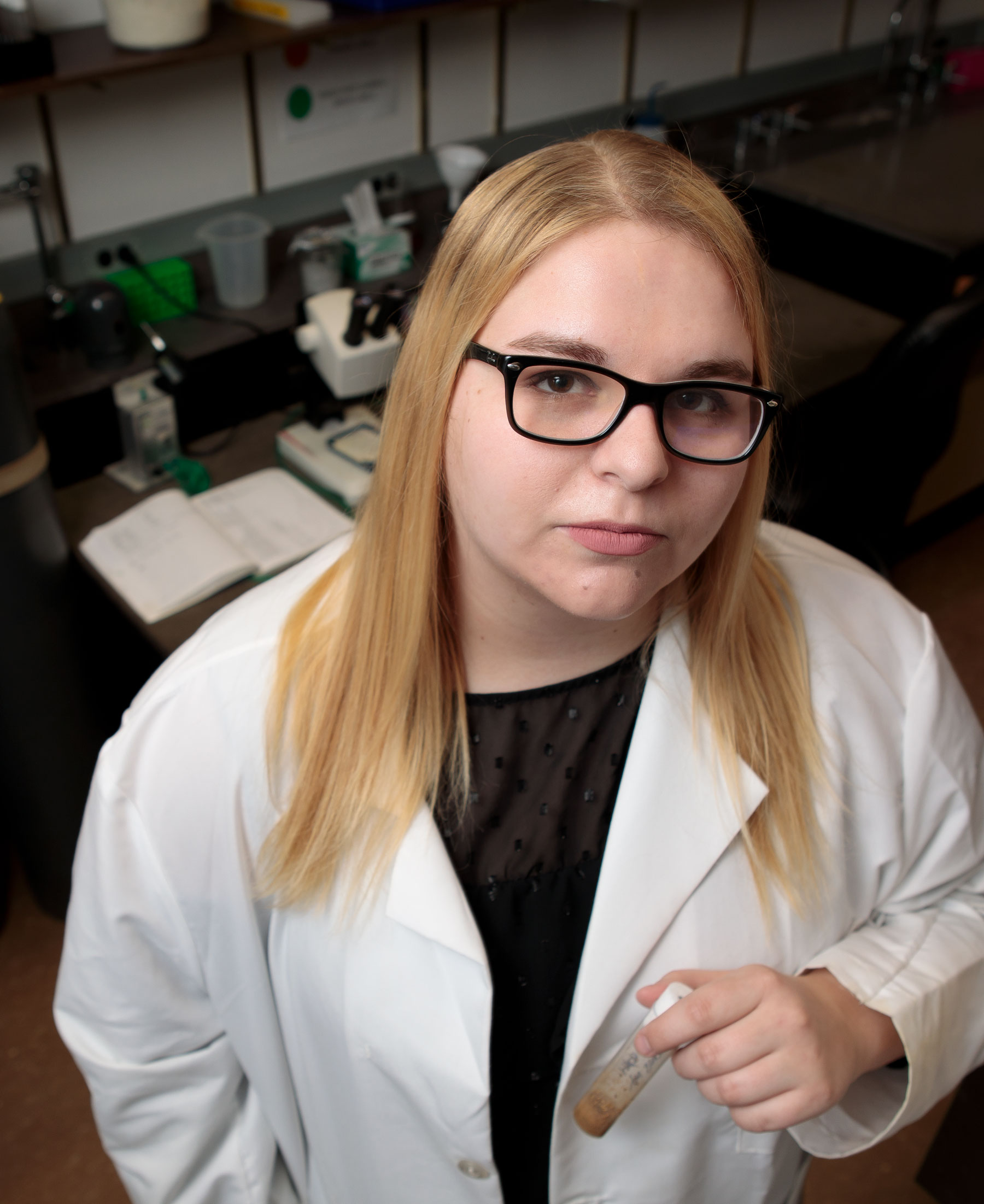 Biology student works on research.