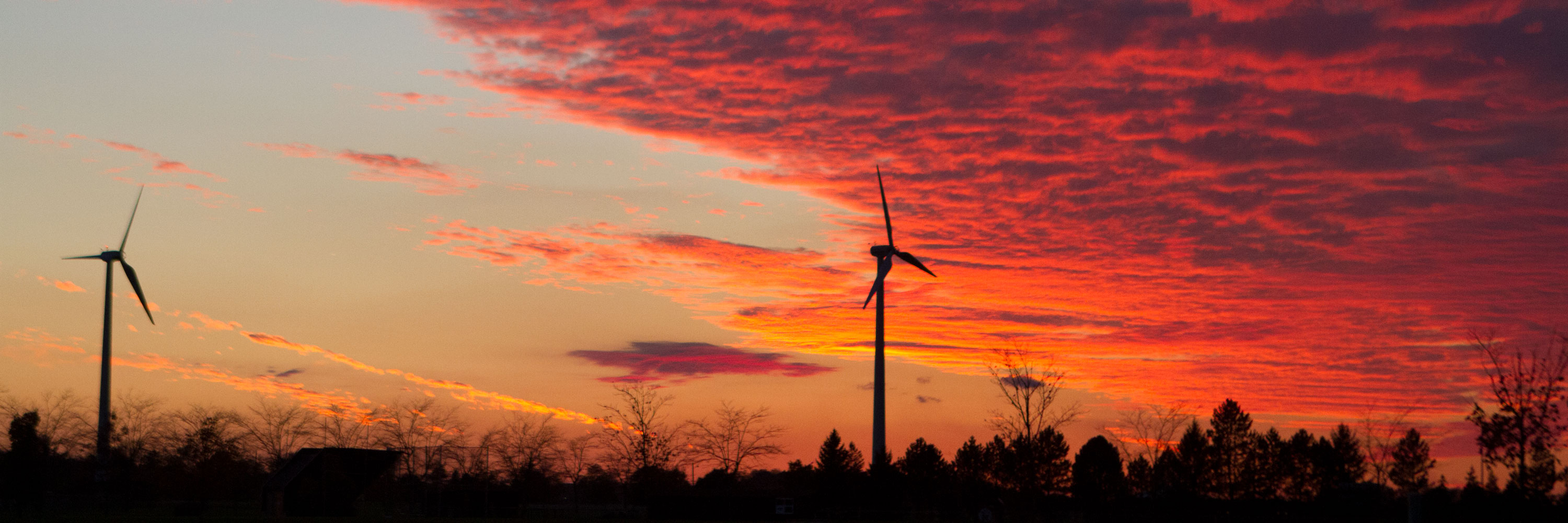 Wind turbines at sunset