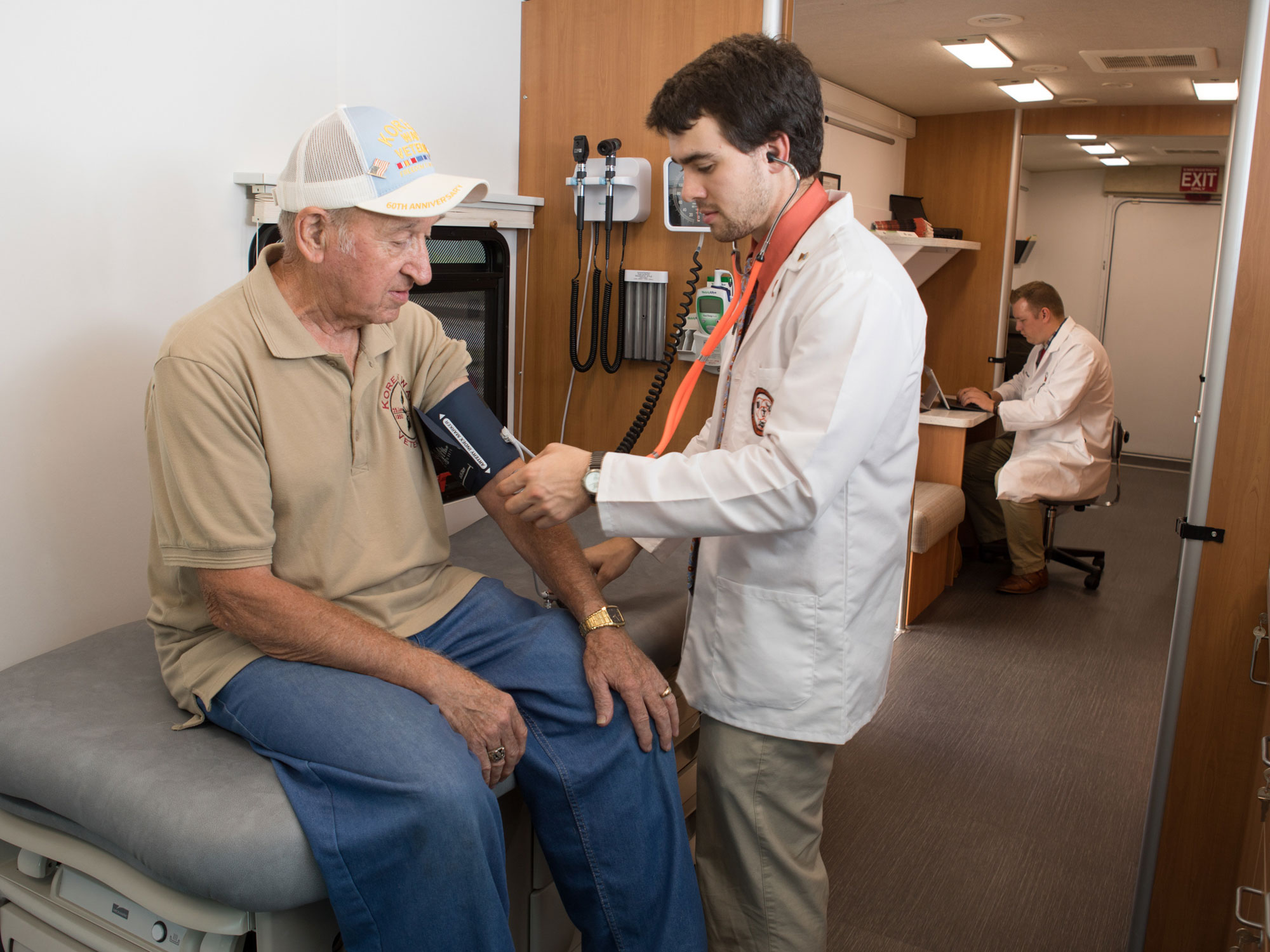 student works in the mobile clinic.