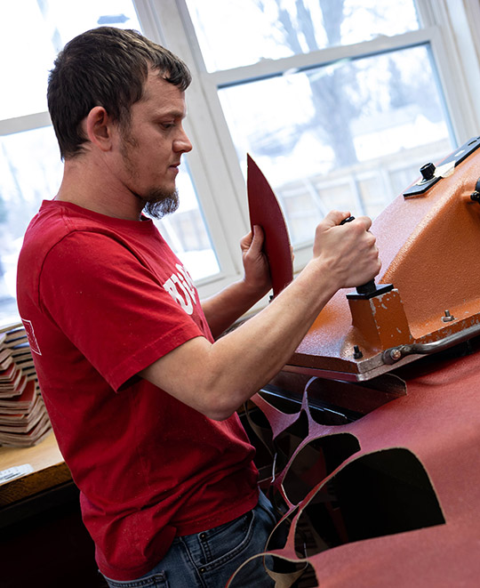 Stamping the leather panels