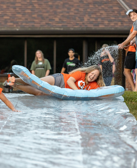 Sara on a slip and slide