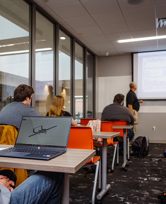 Computer Engineering class with students and instructor