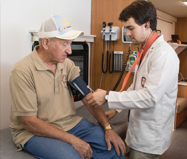 Nursing student practicing with patient