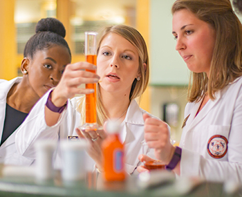 student in lab coats