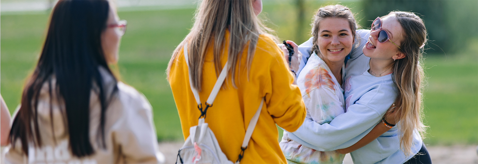 Photo of students hugging