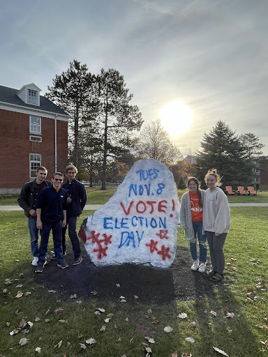 ONU students around large rock painted with ONU Votes