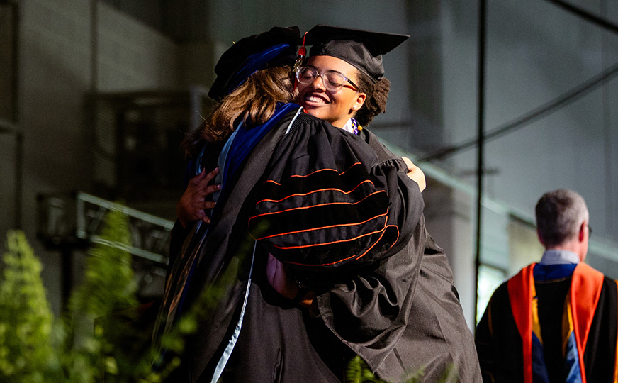 Photo of Aliyah getting her diploma