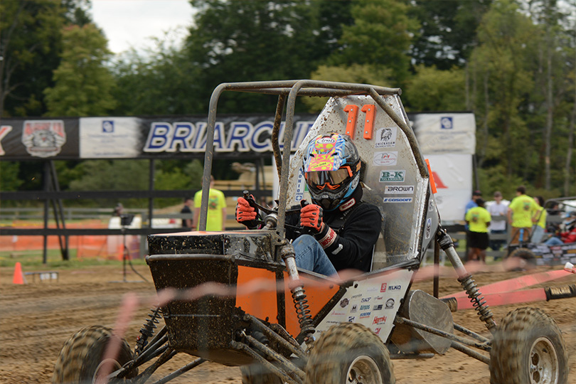 Photo of student in off road vehicle