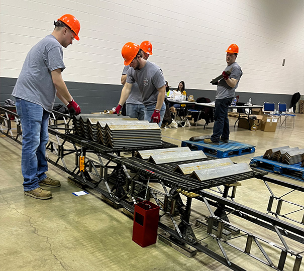 Photo of bridge making team