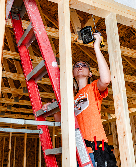 ONU Student working on building a Wall