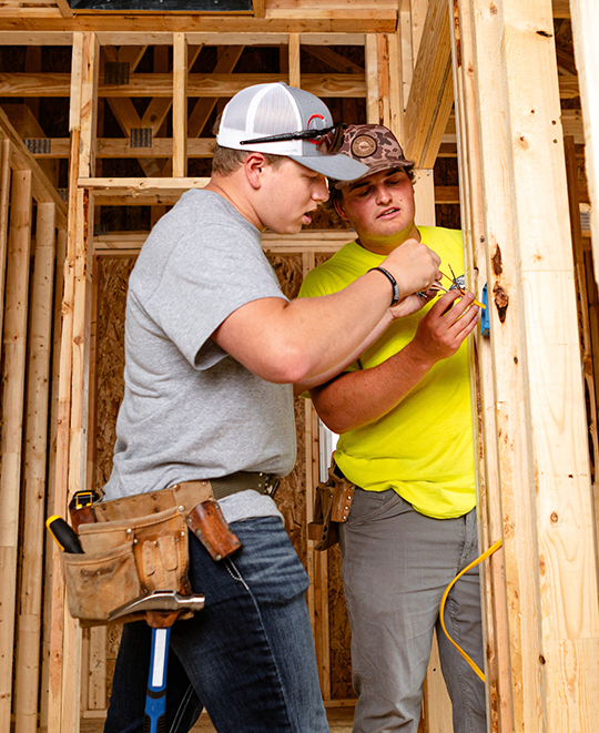 ONU Students working on building a Wall