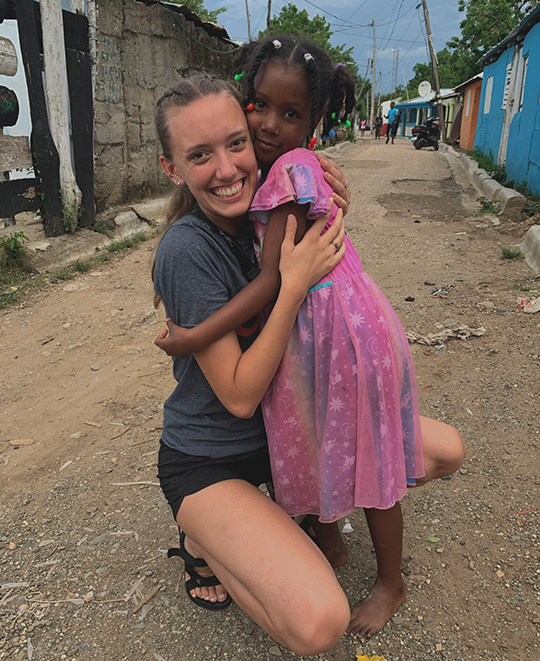 ONU Student spending time with a local child
