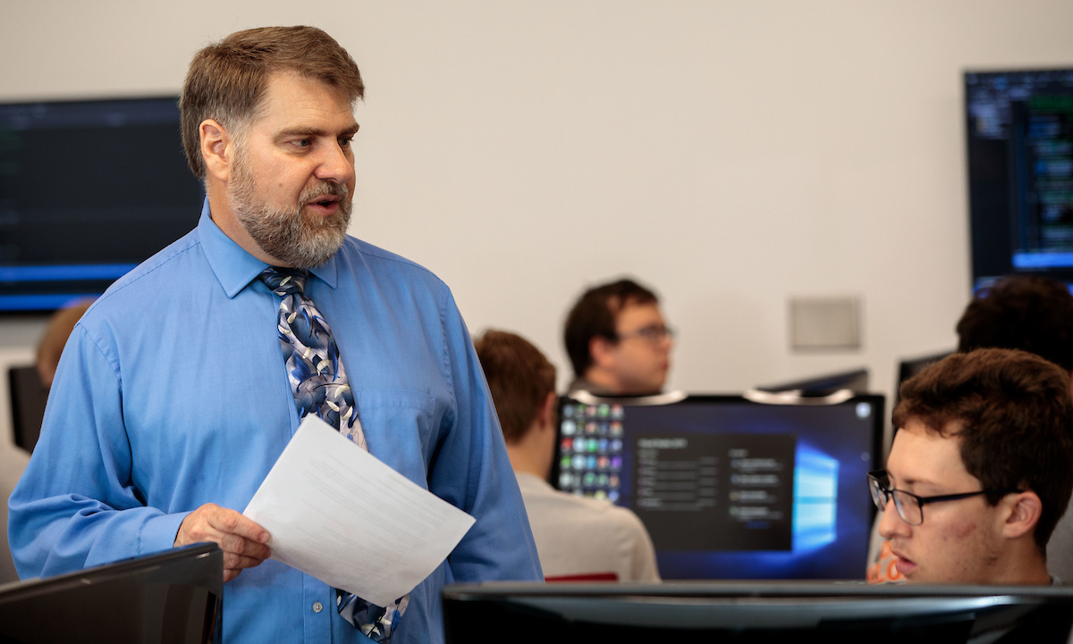 Computer Science faculty member teaching a class