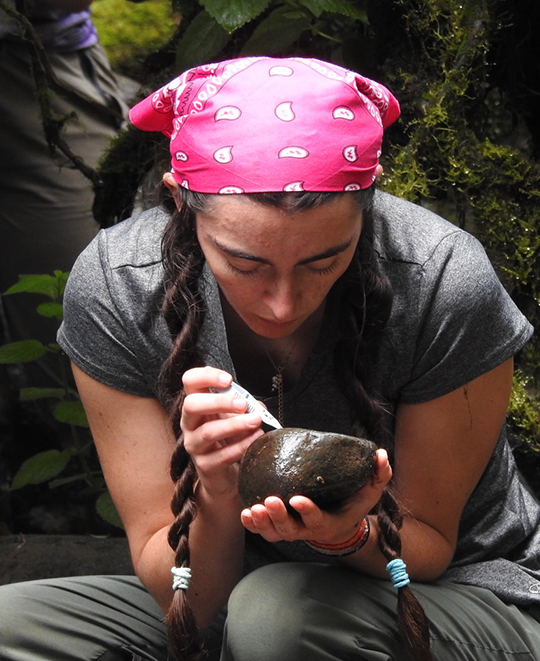 Photo of ONU student studying something up close