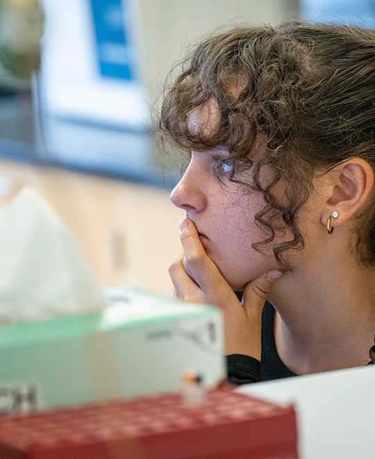 Close up photo of Elizabeth working