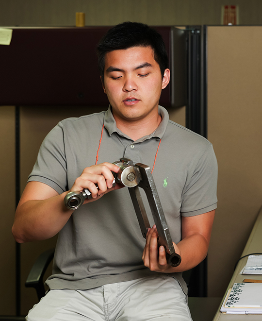 Photo of Long working on some part