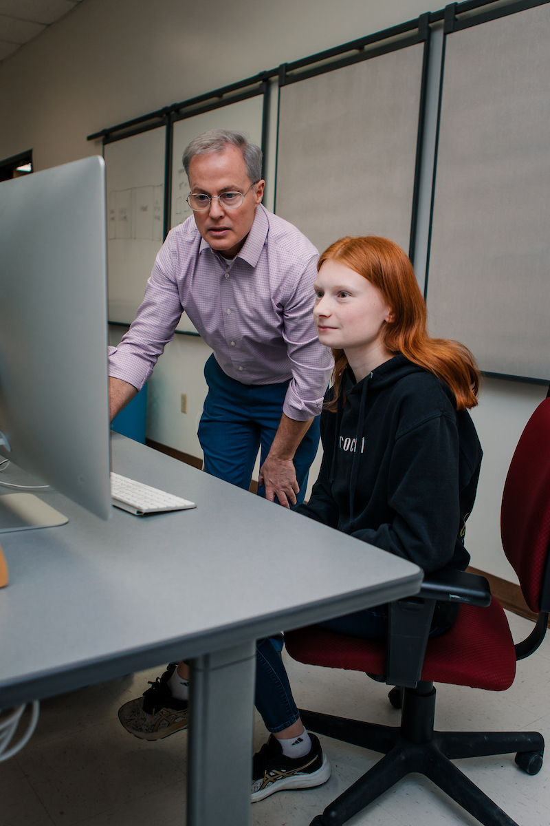 professor helping student