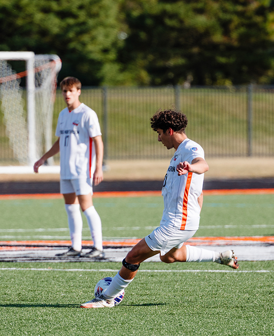 Photo of ONU men soccer player getting ready for a big kick