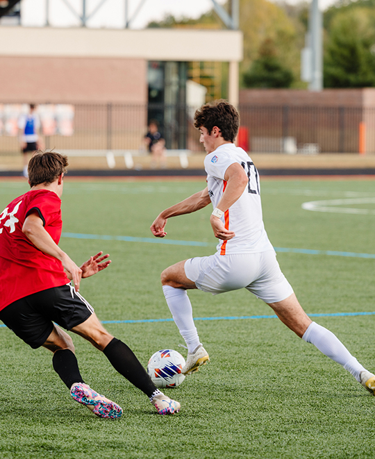 Photo of ONU men soccer player in mid dribble