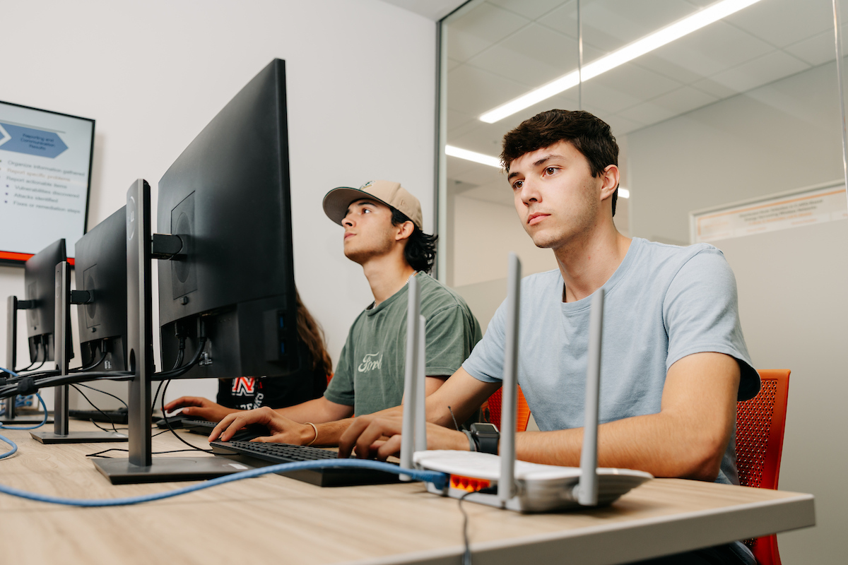 Students working in cybersecurity class
