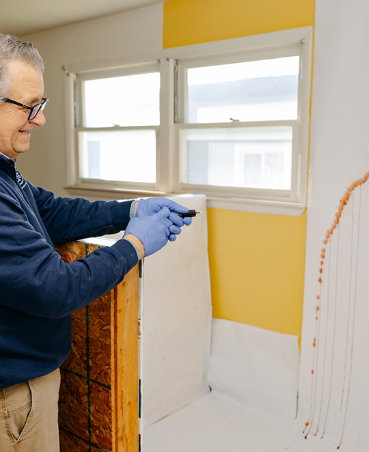 Photo of ONU instructor demonstrating processes