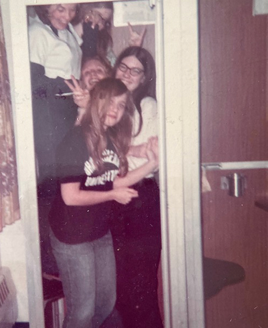 Old Photo of ONU students in what seems like they are crammed into a closet with the door open