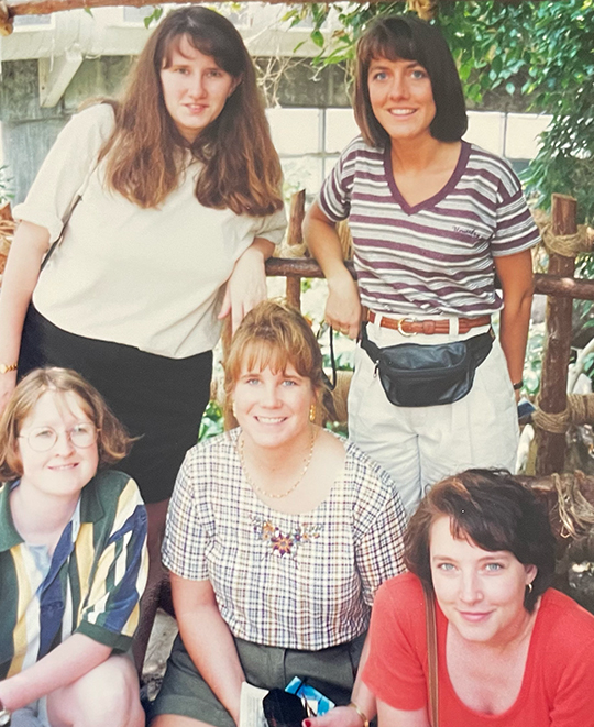 Photo of 5 of the friends when they met together after they graduated